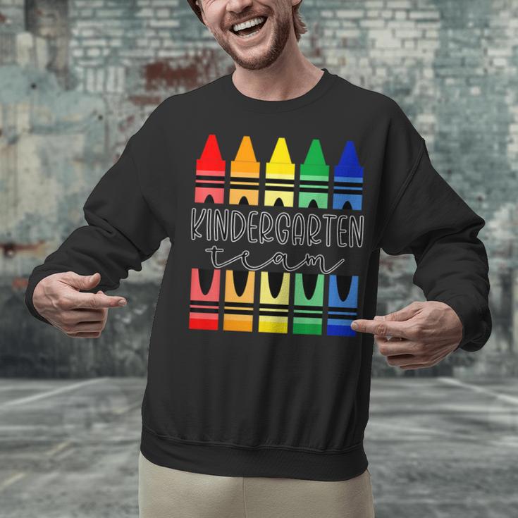 Colorful Crayon Kindergarten Team Tee For Teachers Students Men Women Kids Unisex Sweatshirt, gift for family, gift for coworker Colorful Crayon Kindergarten Team Tee For Teachers Students Men Women Kids Unisex Sweatshirt, gift for family, gift for coworker