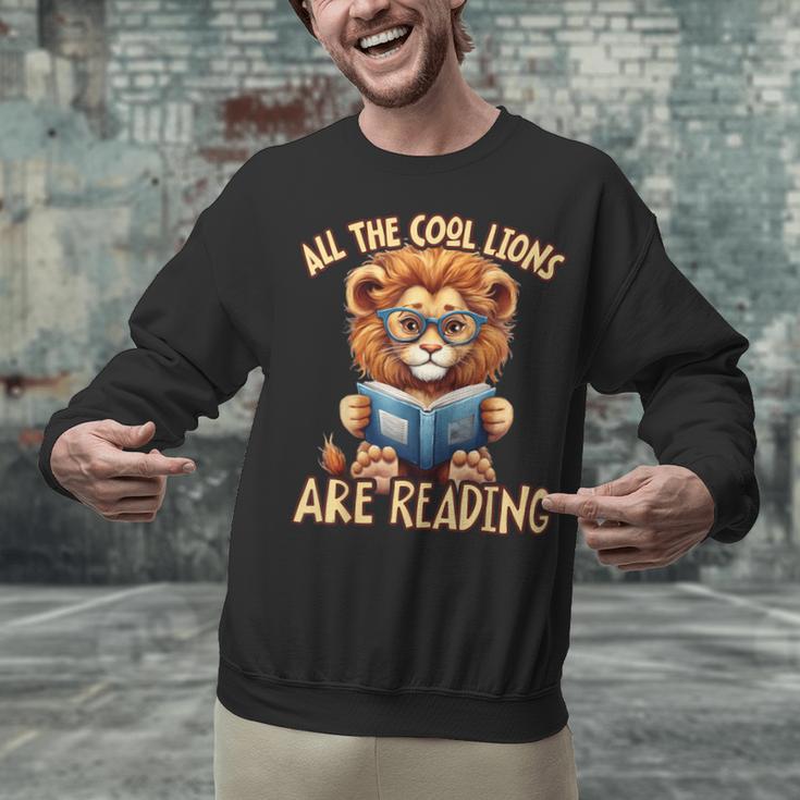All The Cool Lions Are Reading Lion Teacher Men Women Kids Unisex Sweatshirt, gift for family, gift for coworker All The Cool Lions Are Reading Lion Teacher Men Women Kids Unisex Sweatshirt, gift for family, gift for coworker