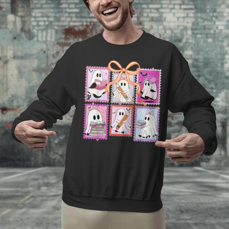 Coquette Bow Spooky Teacher Ghost Halloween Trick Or Teach Unisex Sweatshirt, gift for family, gift for coworker Coquette Bow Spooky Teacher Ghost Halloween Trick Or Teach Unisex Sweatshirt, gift for family, gift for coworker