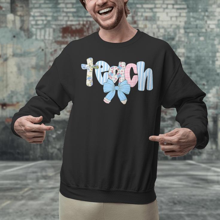 Coquette Bow Teach Teacher Happy First Day Back To School Unisex Sweatshirt, gift for family, gift for coworker Coquette Bow Teach Teacher Happy First Day Back To School Unisex Sweatshirt, gift for family, gift for coworker