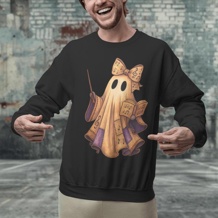 Coquette Music Note Patchwork Ghost Music Teacher Halloween Unisex Sweatshirt, gift for family, gift for coworker Coquette Music Note Patchwork Ghost Music Teacher Halloween Unisex Sweatshirt, gift for family, gift for coworker