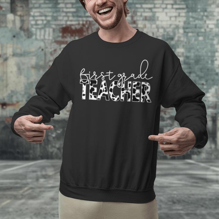 Cow Print For Elementary School First Grade Teachers Unisex Sweatshirt, First Grade Teacher Sweatshirts, gift for family, gift for coworker Cow Print For Elementary School First Grade Teachers Unisex Sweatshirt, First Grade Teacher Sweatshirts, gift for family, gift for coworker