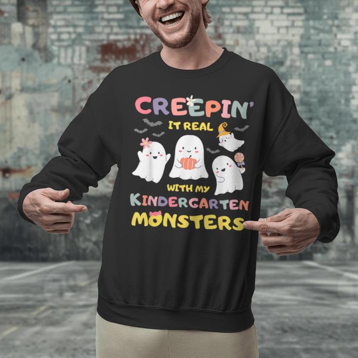 Creepin It Real With Kindergarten Monsters Halloween Teacher Unisex Sweatshirt, gift for family, gift for coworker Creepin It Real With Kindergarten Monsters Halloween Teacher Unisex Sweatshirt, gift for family, gift for coworker
