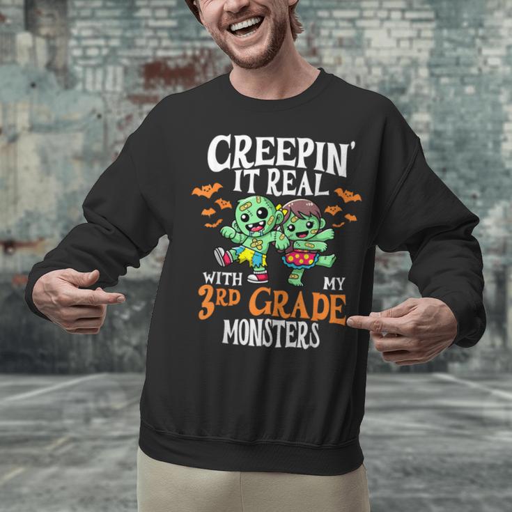 Creepin It Real Monster School 3rd Grade Teacher Halloween Unisex Sweatshirt, gift for family, gift for coworker Creepin It Real Monster School 3rd Grade Teacher Halloween Unisex Sweatshirt, gift for family, gift for coworker