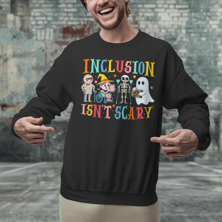 Cute Inclusion Isn't Scary Teacher Skeleton Ghost Halloween Unisex Sweatshirt, gift for family, gift for coworker Cute Inclusion Isn't Scary Teacher Skeleton Ghost Halloween Unisex Sweatshirt, gift for family, gift for coworker