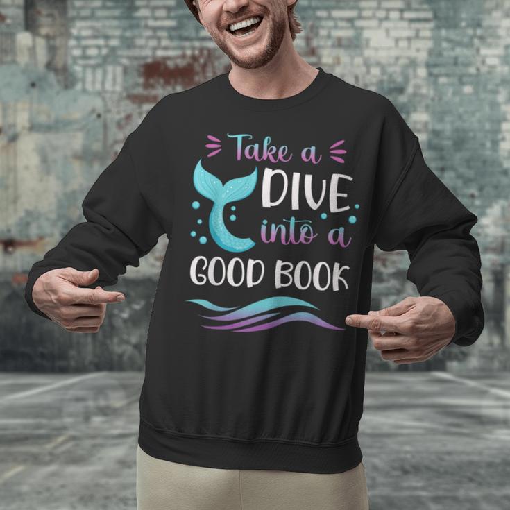 Cute Mermaid Librarian Teacher Dive Into A Good Book Reading Unisex Sweatshirt, gift for family, gift for coworker