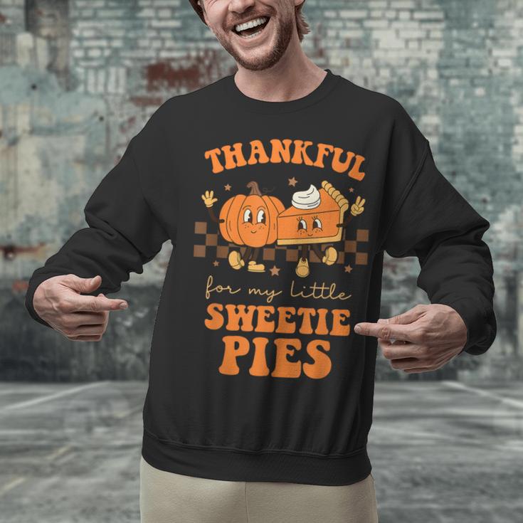 Cute Thanksgiving Teacher Thankful For My Sweetie Pies Mom Unisex Sweatshirt, gift for family, gift for coworker Cute Thanksgiving Teacher Thankful For My Sweetie Pies Mom Unisex Sweatshirt, gift for family, gift for coworker