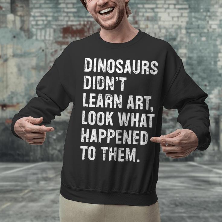 Dinosaurs Didn't Learn Art Art Teacher Unisex Sweatshirt, gift for family, gift for coworker Dinosaurs Didn't Learn Art Art Teacher Unisex Sweatshirt, gift for family, gift for coworker