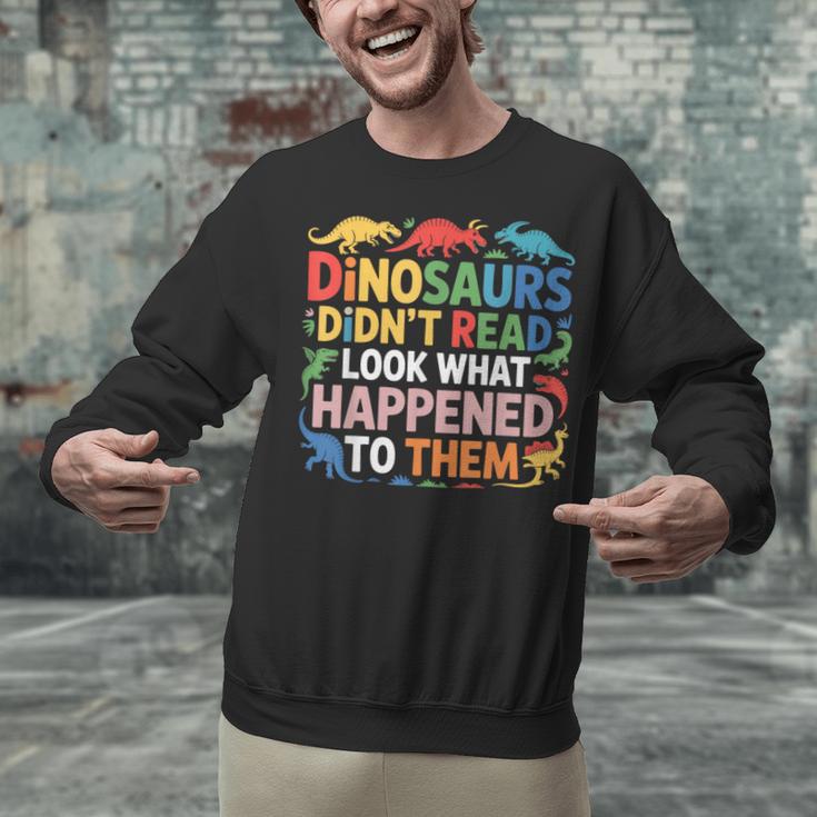 Dinosaurs Didnt Read Look What Happened To Them Cute Teacher Unisex Sweatshirt, gift for family, gift for coworker Dinosaurs Didnt Read Look What Happened To Them Cute Teacher Unisex Sweatshirt, gift for family, gift for coworker