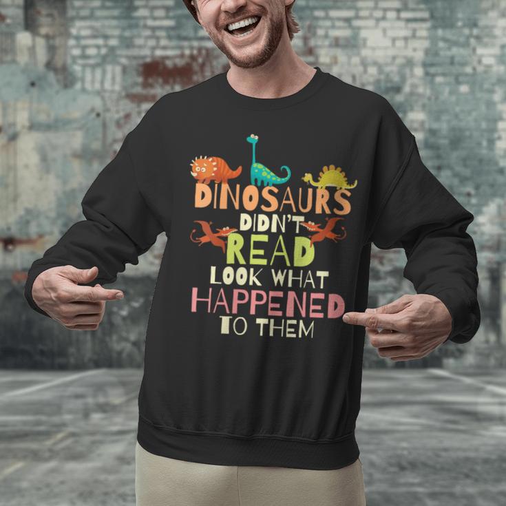Dinosaurs Didnt Read Look What Happened To Them Teacher Unisex Sweatshirt, gift for family, gift for coworker Dinosaurs Didnt Read Look What Happened To Them Teacher Unisex Sweatshirt, gift for family, gift for coworker