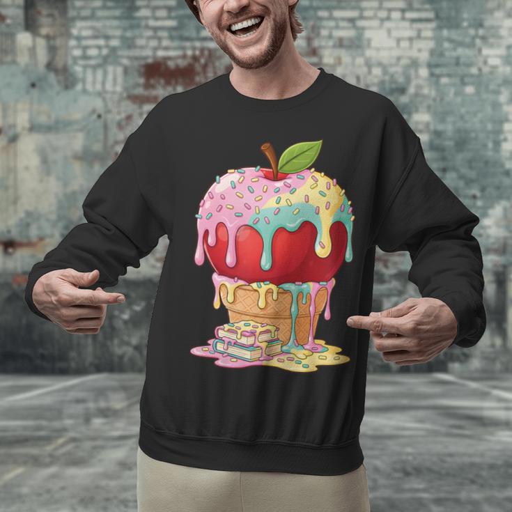 Dripping Apple Ice Cream Cone Cute Teacher Appreciation Unisex Sweatshirt, gift for family, gift for coworker Dripping Apple Ice Cream Cone Cute Teacher Appreciation Unisex Sweatshirt, gift for family, gift for coworker