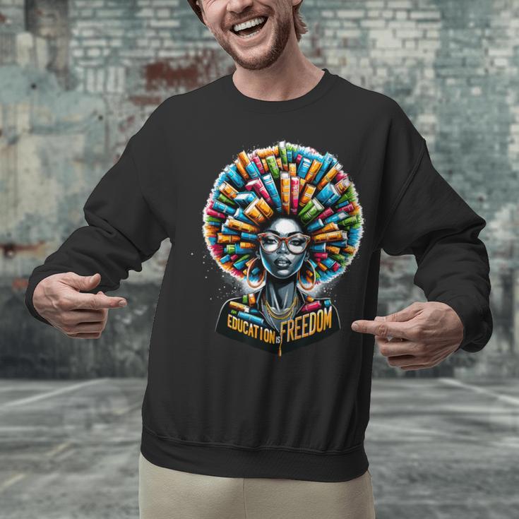 Education Is Freedom History Month Teacher Books Afro Unisex Sweatshirt, History Teacher Sweatshirts, gift for family, gift for coworker