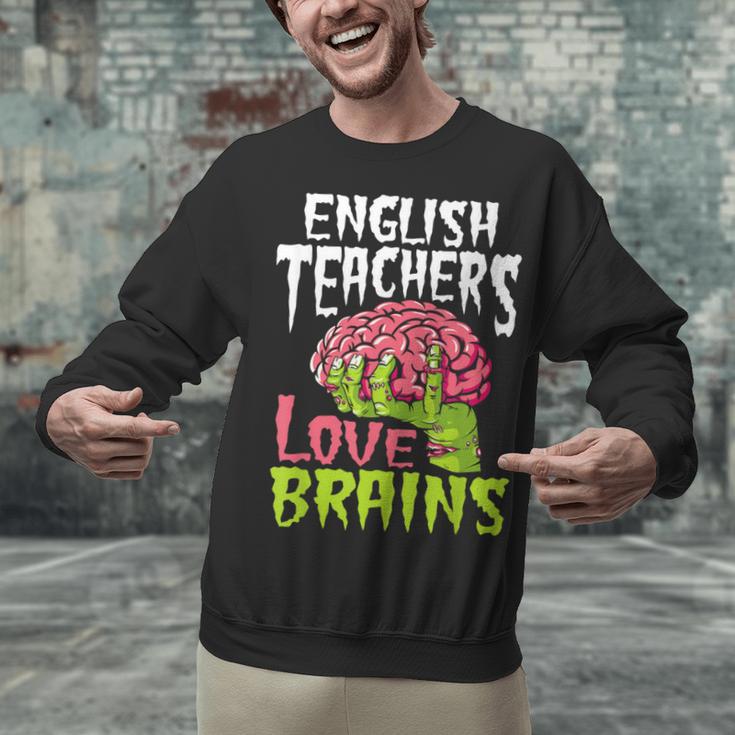 English Teachers Love Brains Zombie Teacher School Halloween Unisex Sweatshirt, English Teacher Sweatshirts, gift for family, gift for coworker