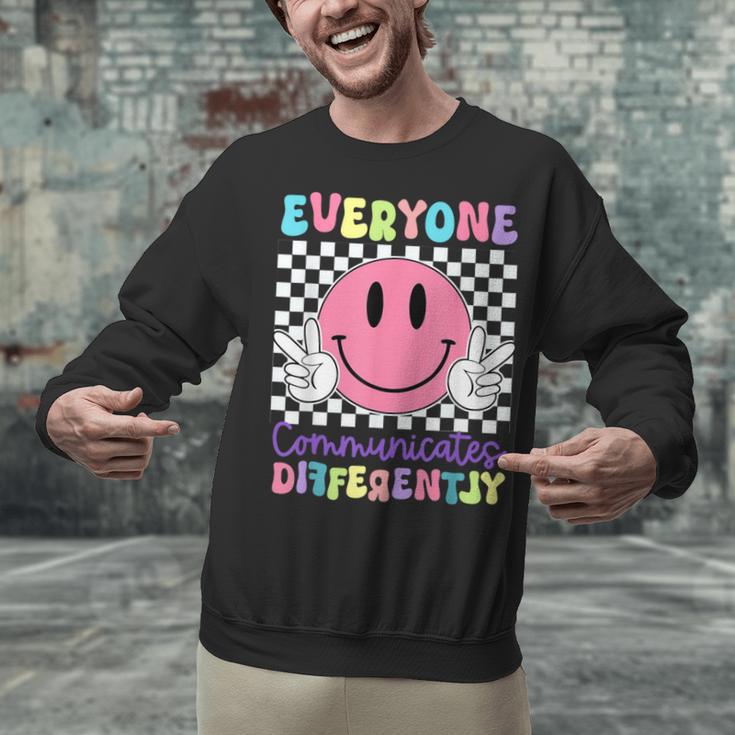 Everyone Communicates Differently Autism Awareness Teacher Unisex Sweatshirt, gift for family, gift for coworker Everyone Communicates Differently Autism Awareness Teacher Unisex Sweatshirt, gift for family, gift for coworker