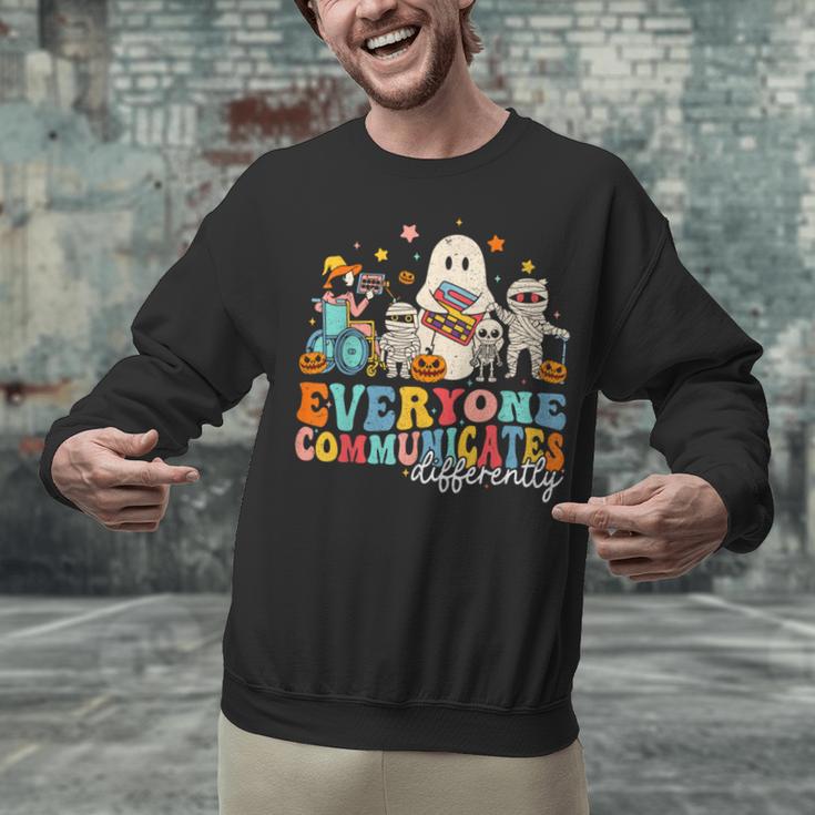 Everyone Communicates Differently Halloween SLP Sped Teacher Unisex Sweatshirt, gift for family, gift for coworker Everyone Communicates Differently Halloween SLP Sped Teacher Unisex Sweatshirt, gift for family, gift for coworker