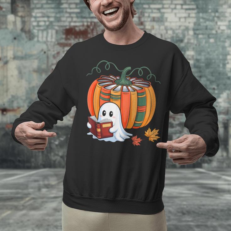 Fall Book Pumpkin Ghost Reading Books Halloween Teacher Unisex Sweatshirt, gift for family, gift for coworker Fall Book Pumpkin Ghost Reading Books Halloween Teacher Unisex Sweatshirt, gift for family, gift for coworker