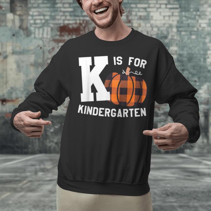 Fall Kindergarten Teacher K Is For Buffalo Plaid Pumpkin Unisex Sweatshirt, gift for family, gift for coworker Fall Kindergarten Teacher K Is For Buffalo Plaid Pumpkin Unisex Sweatshirt, gift for family, gift for coworker