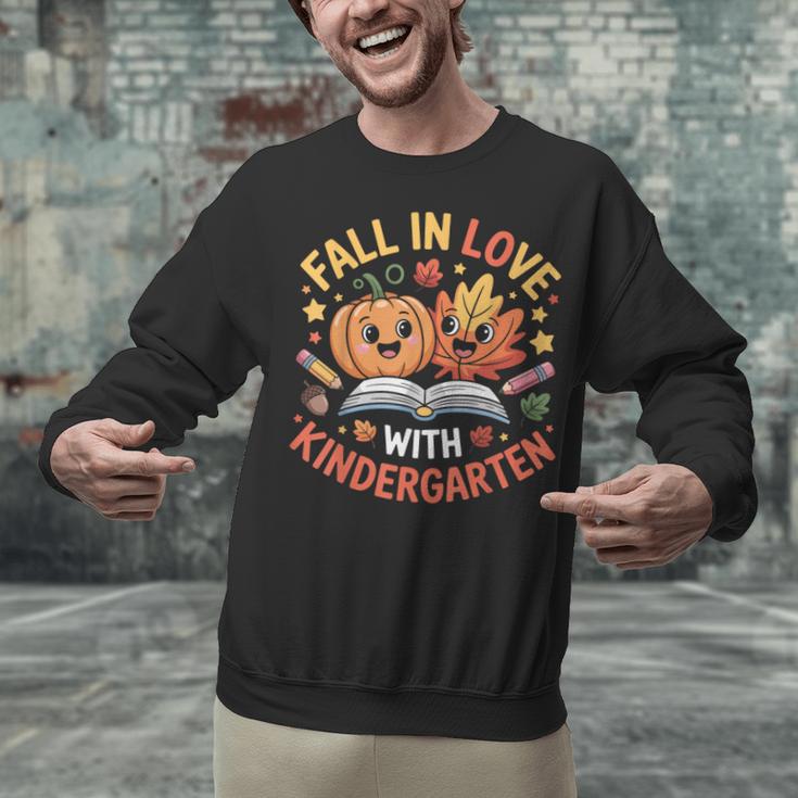 Fall In Love With Kindergarten Autumn Kindergarten Teacher Unisex Sweatshirt, gift for family, gift for coworker Fall In Love With Kindergarten Autumn Kindergarten Teacher Unisex Sweatshirt, gift for family, gift for coworker
