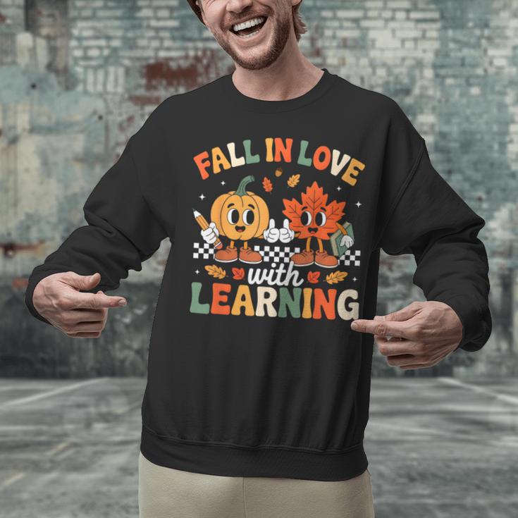 Fall In Love With Learning Shirt Autumn Thanksgiving Teacher Unisex Sweatshirt, gift for family, gift for coworker Fall In Love With Learning Shirt Autumn Thanksgiving Teacher Unisex Sweatshirt, gift for family, gift for coworker
