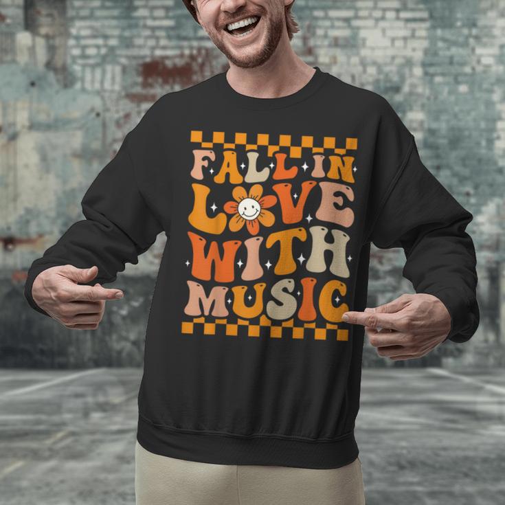 Fall In Love With Music Groovy Thanksgiving Music Teacher Men Women Girls Kids Unisex Sweatshirt, Groovy Teacher Sweatshirts, gift for family, gift for coworker