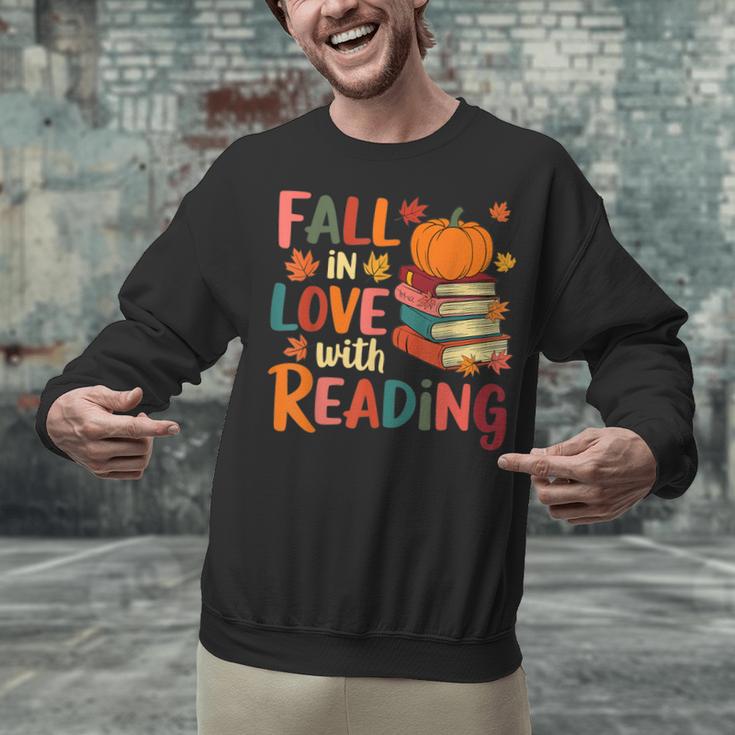 Fall In Love With Reading Autumn Thanksgiving Shirt Teacher Unisex Sweatshirt, gift for family, gift for coworker Fall In Love With Reading Autumn Thanksgiving Shirt Teacher Unisex Sweatshirt, gift for family, gift for coworker