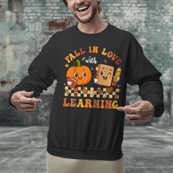 Fall In Love With Reading Book Autumn Pumpkins And Teachers Unisex Sweatshirt, gift for family, gift for coworker Fall In Love With Reading Book Autumn Pumpkins And Teachers Unisex Sweatshirt, gift for family, gift for coworker