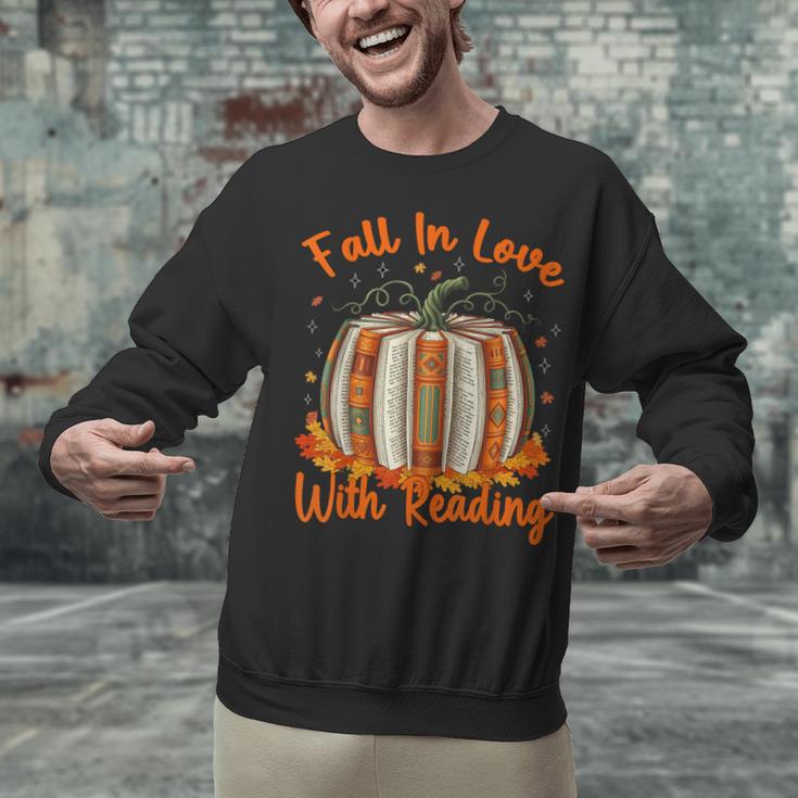Fall In Love With Reading Pumpkin Autumn Librarians Teacher Unisex Sweatshirt, gift for family, gift for coworker Fall In Love With Reading Pumpkin Autumn Librarians Teacher Unisex Sweatshirt, gift for family, gift for coworker