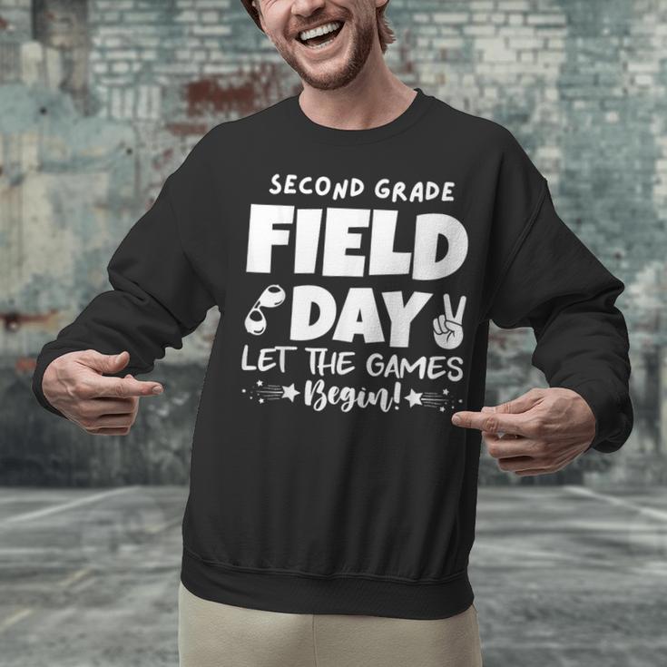 Field Day Second 2nd Grade Orange 2025 Boy Girl Teacher Unisex Sweatshirt, 2nd Grade Teacher Sweatshirts, gift for family, gift for coworker Field Day Second 2nd Grade Orange 2025 Boy Girl Teacher Unisex Sweatshirt, 2nd Grade Teacher Sweatshirts, gift for family, gift for coworker