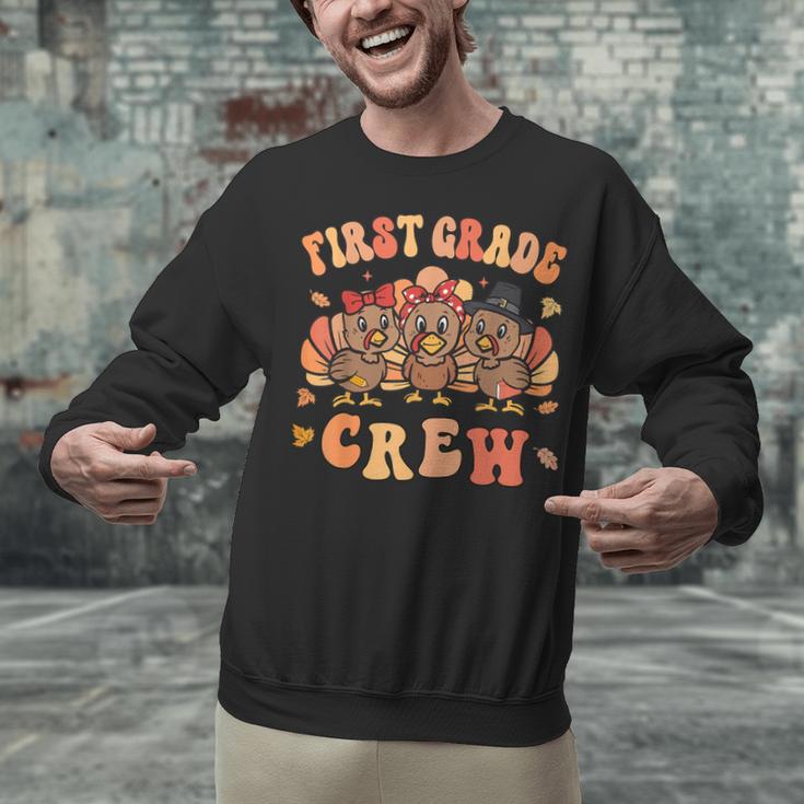 First Grade Crew Thanksgiving Fall Teacher 1st Grade Team Unisex Sweatshirt, First Grade Teacher Sweatshirts, gift for family, gift for coworker First Grade Crew Thanksgiving Fall Teacher 1st Grade Team Unisex Sweatshirt, First Grade Teacher Sweatshirts, gift for family, gift for coworker