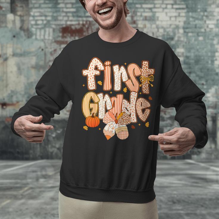 First Grade Fall Floral Coquette Bow Teachers Students Unisex Sweatshirt, First Grade Teacher Sweatshirts, gift for family, gift for coworker First Grade Fall Floral Coquette Bow Teachers Students Unisex Sweatshirt, First Grade Teacher Sweatshirts, gift for family, gift for coworker