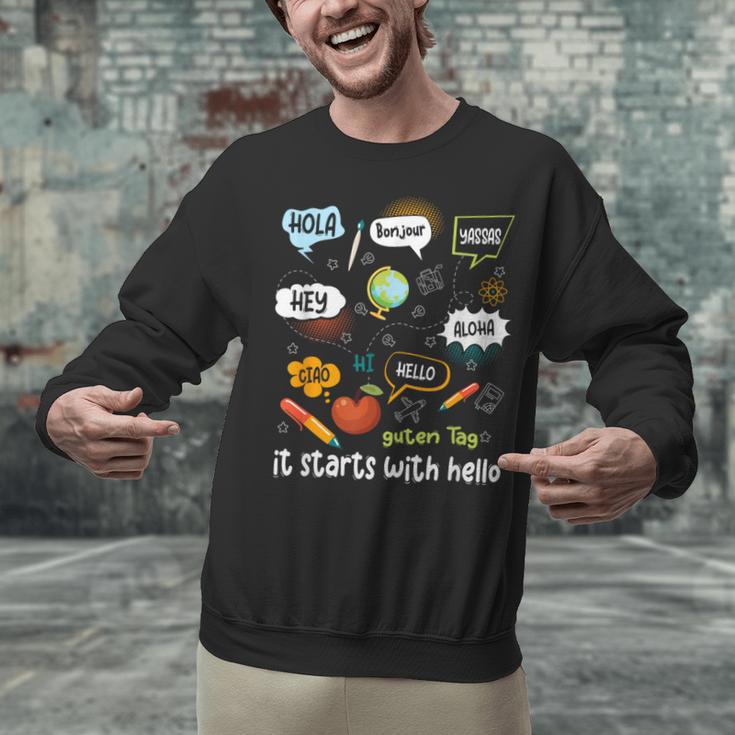 Friendship Inclusion Language Teacher It Starts With Hello Unisex Sweatshirt, gift for family, gift for coworker Friendship Inclusion Language Teacher It Starts With Hello Unisex Sweatshirt, gift for family, gift for coworker