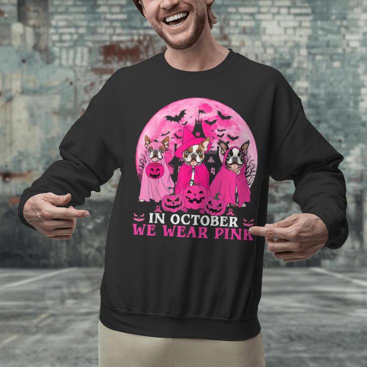 Ghost And Witch Boston Terrier Dog In October We Wear Pink Unisex Sweatshirt, Boston Terrier Ghost Sweatshirts, gift for family, gift for coworker