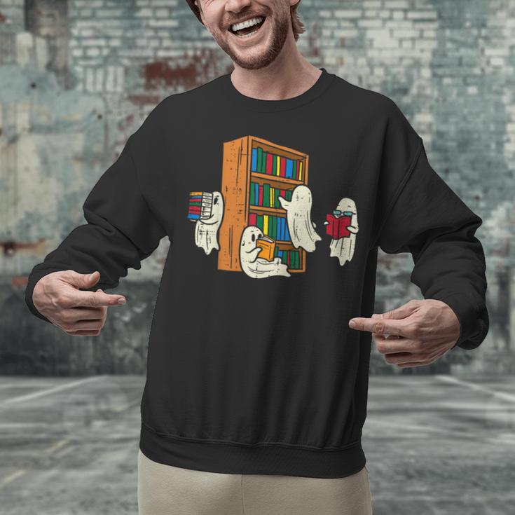 Ghosts Reading Books Teacher Halloween Librarian Boooks Unisex Sweatshirt, gift for family, gift for coworker Ghosts Reading Books Teacher Halloween Librarian Boooks Unisex Sweatshirt, gift for family, gift for coworker