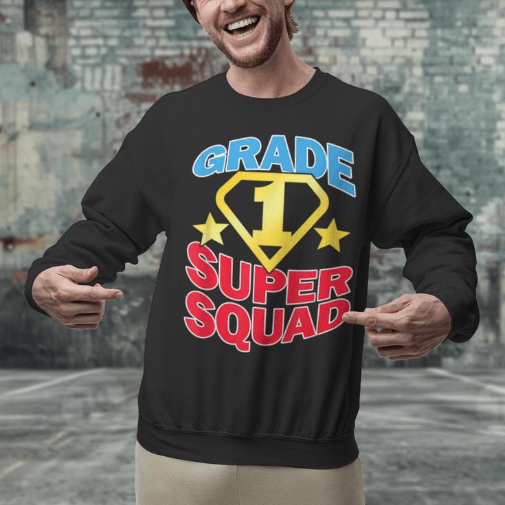 Grade 1 Super Squad Superhero Teacher Team Unisex Sweatshirt, Super Teacher Sweatshirts, gift for family, gift for coworker Grade 1 Super Squad Superhero Teacher Team Unisex Sweatshirt, Super Teacher Sweatshirts, gift for family, gift for coworker