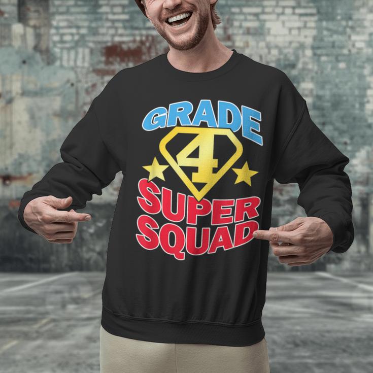 Grade 4 Super Squad Superhero Teacher Team Unisex Sweatshirt, Super Teacher Sweatshirts, gift for family, gift for coworker Grade 4 Super Squad Superhero Teacher Team Unisex Sweatshirt, Super Teacher Sweatshirts, gift for family, gift for coworker