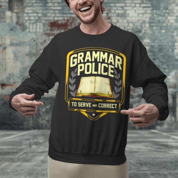 Grammar Police To Serve And Correct English Teacher Unisex Sweatshirt, English Teacher Sweatshirts, gift for family, gift for coworker Grammar Police To Serve And Correct English Teacher Unisex Sweatshirt, English Teacher Sweatshirts, gift for family, gift for coworker
