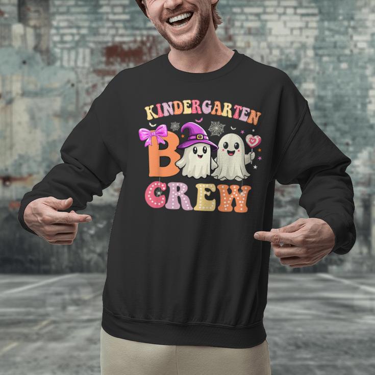 Groovy Kindergarten Boo Crew Kinder Halloween Teacher Kids Unisex Sweatshirt, Groovy Teacher Sweatshirts, gift for family, gift for coworker Groovy Kindergarten Boo Crew Kinder Halloween Teacher Kids Unisex Sweatshirt, Groovy Teacher Sweatshirts, gift for family, gift for coworker