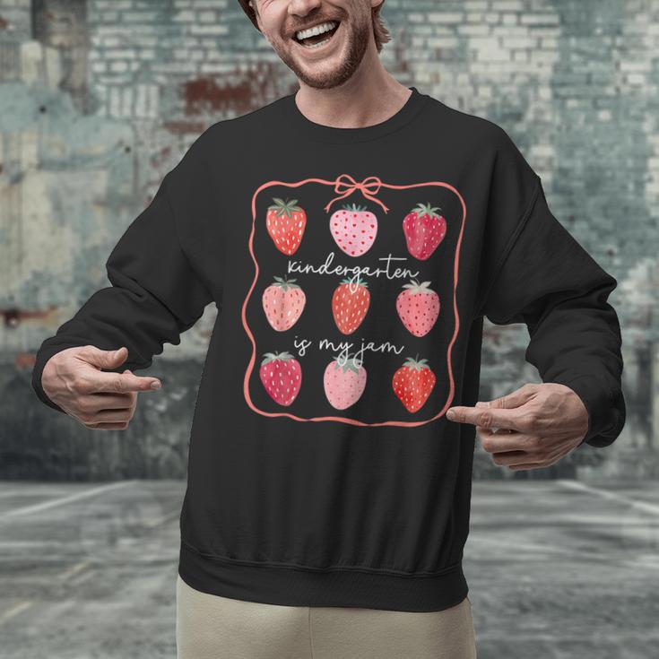 Groovy Kindergarten Is My Jam Strawberry Kinder Team Teacher Unisex Sweatshirt, Groovy Teacher Sweatshirts, gift for family, gift for coworker Groovy Kindergarten Is My Jam Strawberry Kinder Team Teacher Unisex Sweatshirt, Groovy Teacher Sweatshirts, gift for family, gift for coworker
