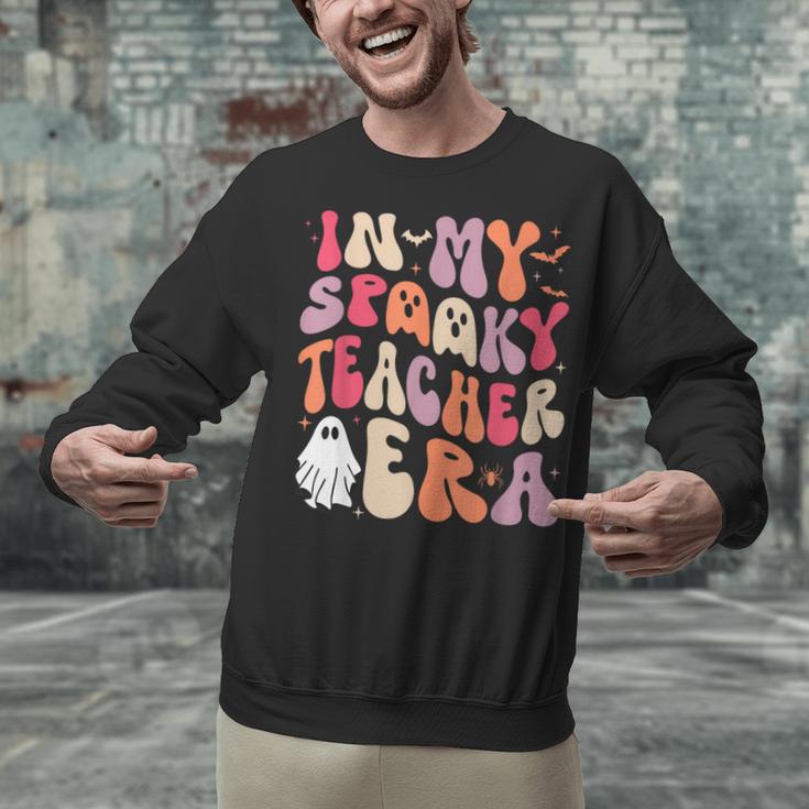 Groovy In My Spooky Teacher Era Halloween Party Boo Unisex Sweatshirt, Groovy Teacher Sweatshirts, gift for family, gift for coworker Groovy In My Spooky Teacher Era Halloween Party Boo Unisex Sweatshirt, Groovy Teacher Sweatshirts, gift for family, gift for coworker