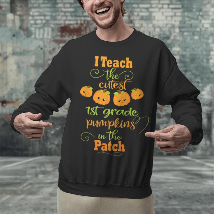 Halloween Cutest Pumpkins First Grade Teacher Unisex Sweatshirt, First Grade Teacher Sweatshirts, gift for family, gift for coworker Halloween Cutest Pumpkins First Grade Teacher Unisex Sweatshirt, First Grade Teacher Sweatshirts, gift for family, gift for coworker