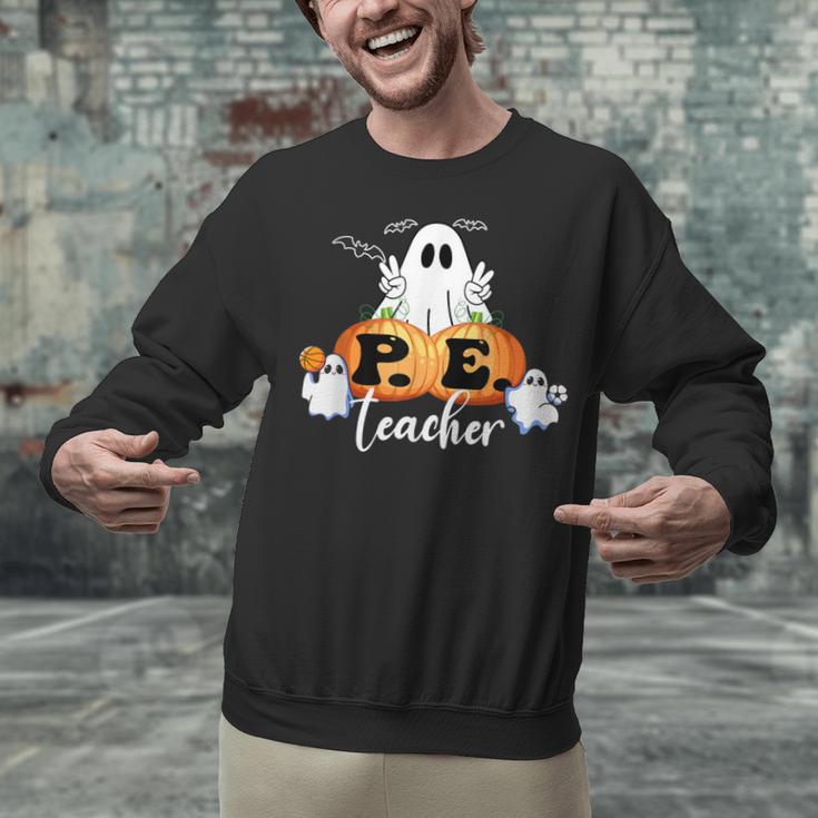 Halloween PE Teacher Ghosts Pumpkins Sports Lover Unisex Sweatshirt, Pe Teacher Sweatshirts, gift for family, gift for coworker Halloween PE Teacher Ghosts Pumpkins Sports Lover Unisex Sweatshirt, Pe Teacher Sweatshirts, gift for family, gift for coworker