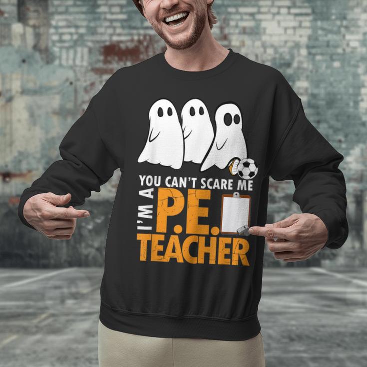 Halloween PE Teacher Shirt Can't Scare Me Unisex Sweatshirt, Pe Teacher Sweatshirts, gift for family, gift for coworker Halloween PE Teacher Shirt Can't Scare Me Unisex Sweatshirt, Pe Teacher Sweatshirts, gift for family, gift for coworker