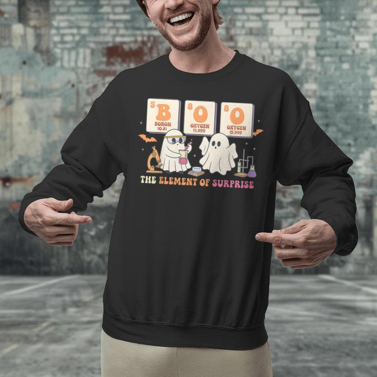 Halloween Science Teacher Boo Ghost The Element Of Surprise Unisex Sweatshirt, Science Teacher Sweatshirts, gift for family, gift for coworker Halloween Science Teacher Boo Ghost The Element Of Surprise Unisex Sweatshirt, Science Teacher Sweatshirts, gift for family, gift for coworker