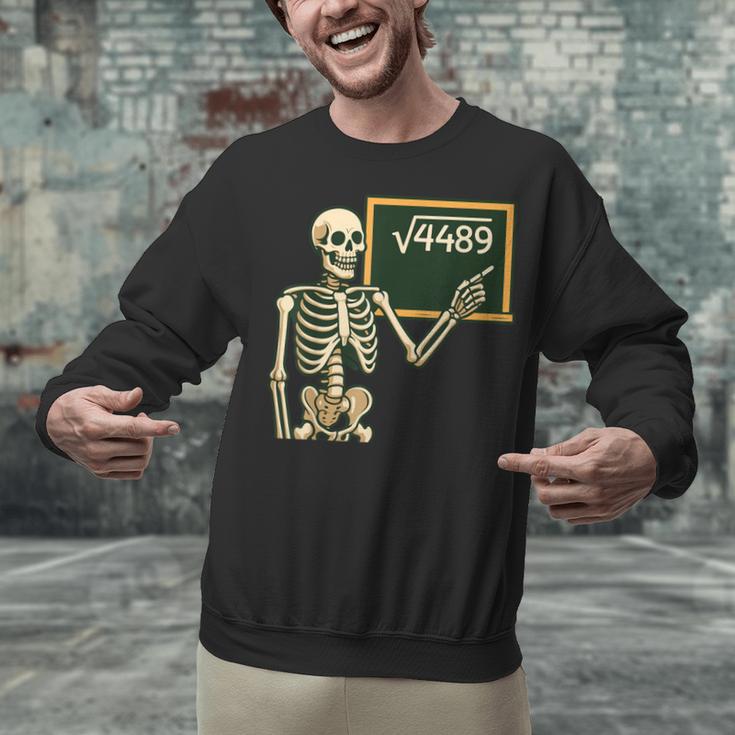 Halloween Skeleton 67 Meme Square Root 4489 Math Teacher Unisex Sweatshirt, gift for family, gift for coworker Halloween Skeleton 67 Meme Square Root 4489 Math Teacher Unisex Sweatshirt, gift for family, gift for coworker