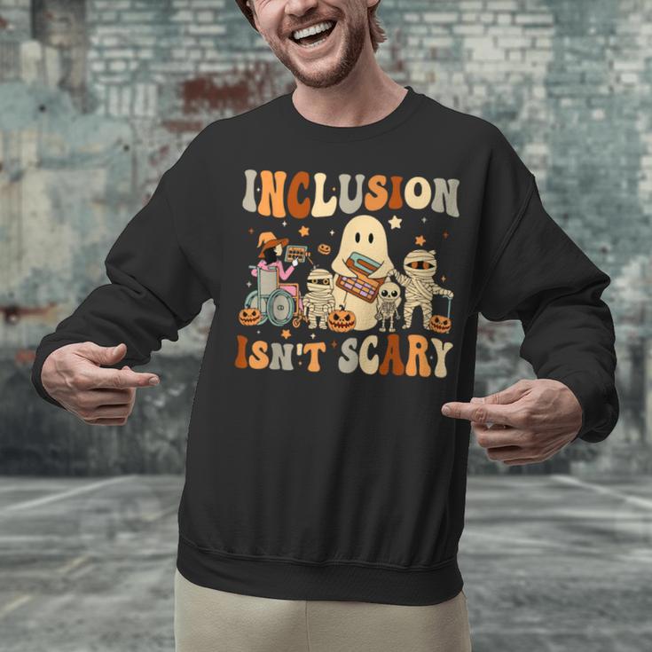 Halloween SLP Sped Teacher Groovy Inclusion Isn't Scary Unisex Sweatshirt, Groovy Teacher Sweatshirts, gift for family, gift for coworker