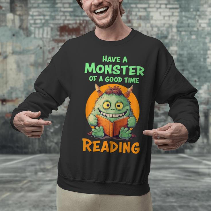 Halloween Teacher Librarian Monster Reading Books Men Women Kids Unisex Sweatshirt, gift for family, gift for coworker Halloween Teacher Librarian Monster Reading Books Men Women Kids Unisex Sweatshirt, gift for family, gift for coworker