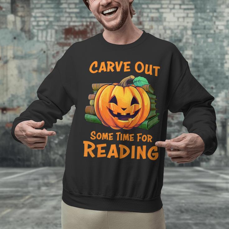 Halloween Teacher Librarian Pumpkin Reading Books Men Women Kids Unisex Sweatshirt, gift for family, gift for coworker Halloween Teacher Librarian Pumpkin Reading Books Men Women Kids Unisex Sweatshirt, gift for family, gift for coworker
