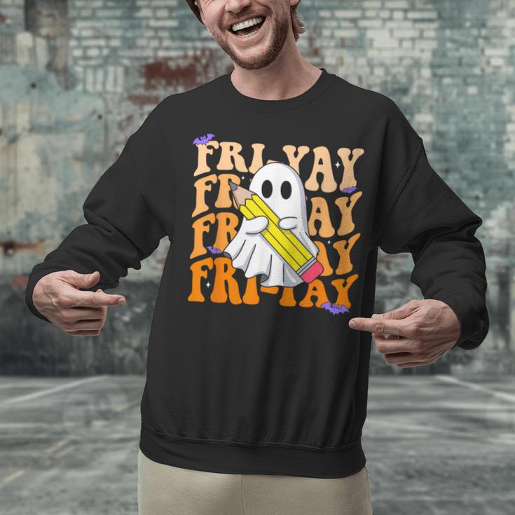 Happy Fri-Yay Friday Lovers Groovy Teacher Life Halloween Unisex Sweatshirt, Groovy Teacher Sweatshirts, gift for family, gift for coworker