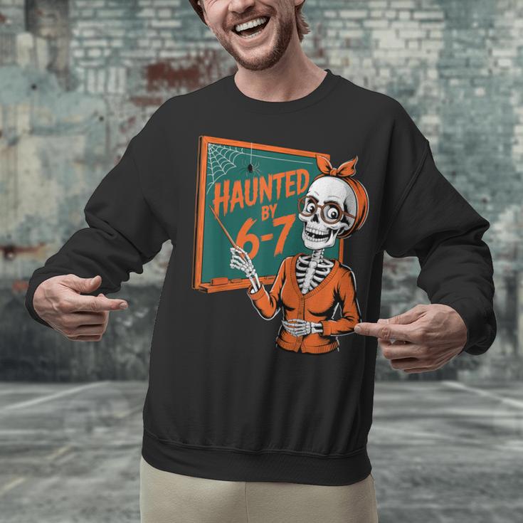 Haunted By 6-7 Six Seven 67 Math Teacher Halloween Skeleton Unisex Sweatshirt, gift for family, gift for coworker