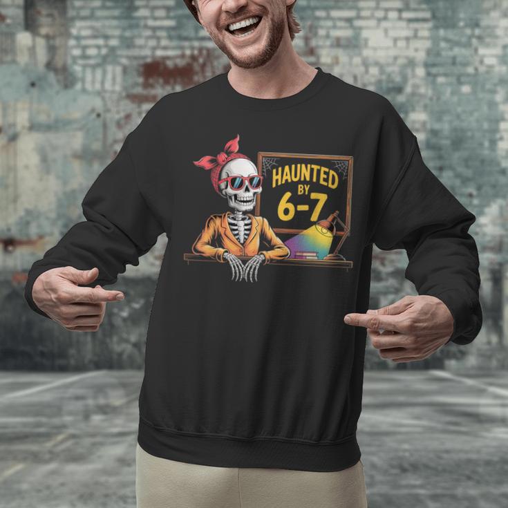 Haunted By 6-7 Teacher Halloween 67 Unisex Sweatshirt, gift for family, gift for coworker Haunted By 6-7 Teacher Halloween 67 Unisex Sweatshirt, gift for family, gift for coworker